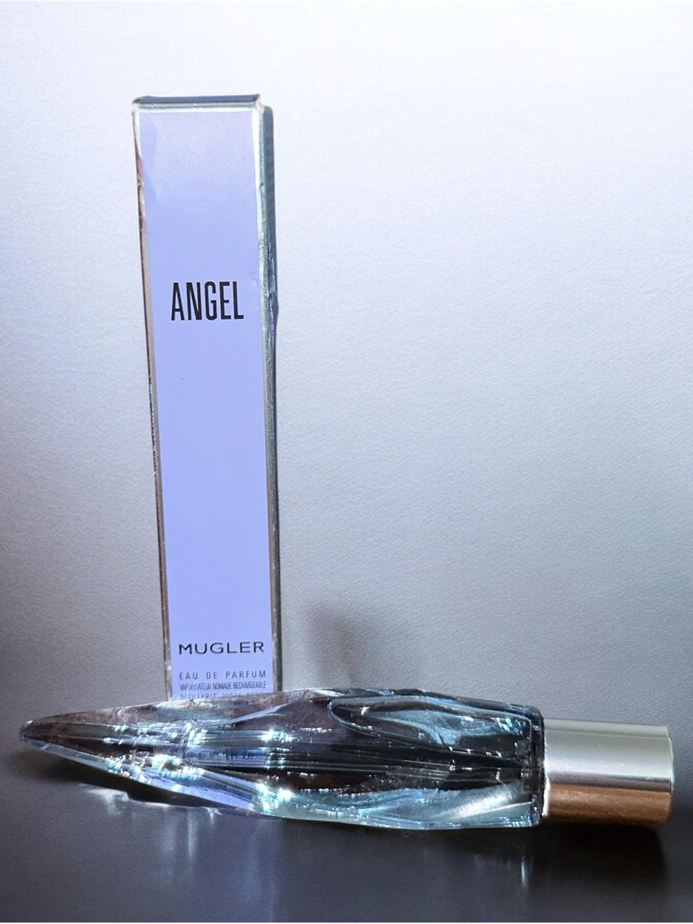 Mugler Angel Perfume Bottle in Pale Blue Glass with Silver Cap